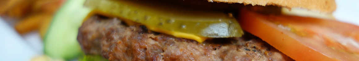 Eating Burger Hot Dog at Karin's Kustard & Hamburgers restaurant in Smyrna, TN.